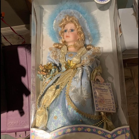 Porcelain doll in original packaging